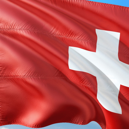 Swiss flag on modern building
